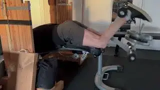 TuffStuff adjustable bench with leg attachment for Leg curls
