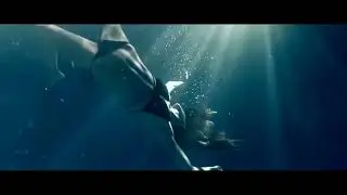 woman sexy in bikini underwater floating relaxed