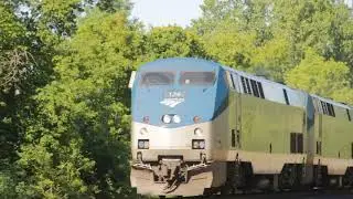 Flange Greaser and an Amtrak train headed east!
