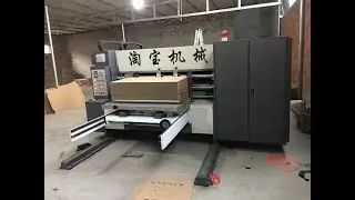 Mini one color flexo prinitng slotting machine.