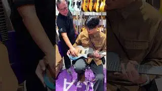 The guitar has a speaker.