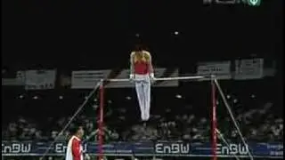 Yang overcomes fall to defend his world all-around title