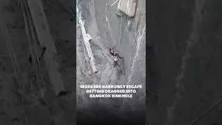 Workers narrowly escape getting dragged into Bangkok sinkhole