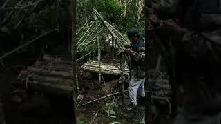 Built this small shelter by the river 🌿No rush, no tools &mdash; just a peaceful build #shorts