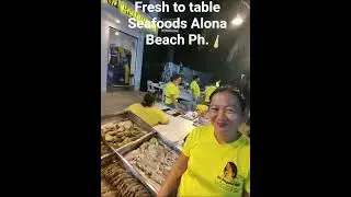 many fresh seafood restaurants cook it while you wait . Alona beach Philippines