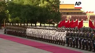 Visiting Zimbabwean President Robert Mugabe meets Chinese counterpart