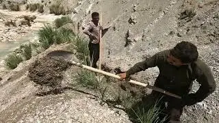 Men's hard work for irrigation in daily rural life
