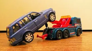 Tow Truck Carrying Toy Cars to Transportation Vehicle