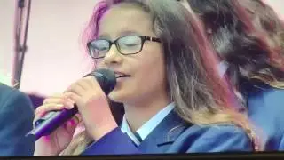 School choir and Ariana Grande give emotional performance at One Love Manchester concert.