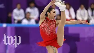 How is figure skating scored?