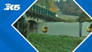 UPS truck strikes bridge in Kelso