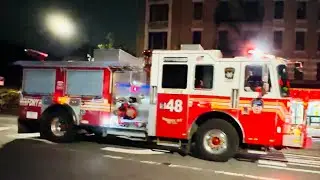 FDNY ENGINE 48 RESPONDING ON FORDHAM ROAD IN UNIVERSITY HEIGHTS AREA OF THE BRONX IN NEW YORK CITY.