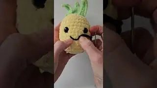Let's embroider a smile on this amigurumi pineapple! 🍍❤️