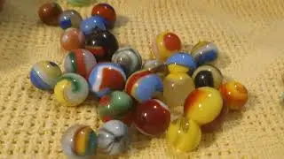 Akro sparklers, tri-onyx Popeyes red and royal blue corkscrews marble King Hot Wheels mibs