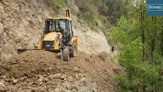 Hilly Narrow Dusty Road-JCB Backhoe Loader-Grading the Dusty Road