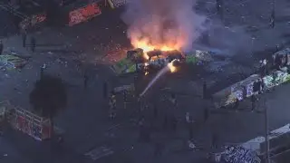 Car set on fire at gathering in Hollywood