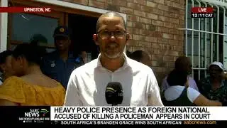 Heavy police presence as foreign national accused of killing a policeman appears in court