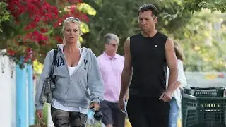 Nicollette Sheridan And A Hunky Male Companion Are Ready For A Weekend Sweat Session