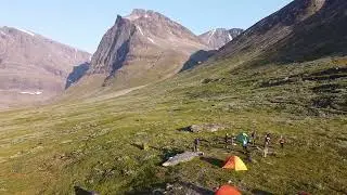 Drone Shot of a Camping Site in a Mountain Valley
