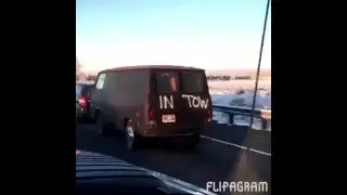 Honda Fit Towing a 3000 LB Van while texting on Interstate.