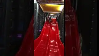 KIAARA ENJOYING SLIDES AT TUMBLE HOUSE