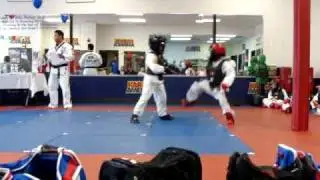 Zach karate graduation sparring