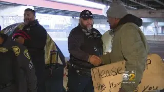 Sheriff's Officers Hand Out Gifts To Homeless At Pilsen Tent City