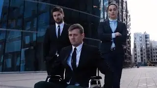 Disabled Businessman With Colleagues Outside Stock Video