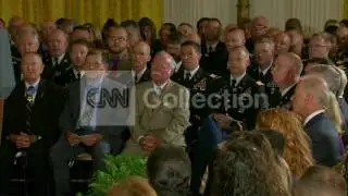 DC:OBAMA MEDAL OF HONOR-SOLDIERS STAND (APPLAUSE)