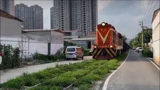 Epic Train Passes Through Tiny Urban Streets!