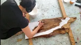Priming live edge slabs for new paintings!
