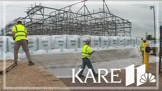 Xcel Energy crews place sandbags around plant as Minnesota River levels rise
