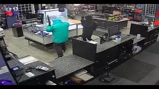 Pawn shop robbery suspects sought