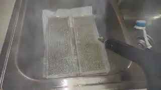 Steam Away the Grease from Range Vent Hood Aluminum Filter