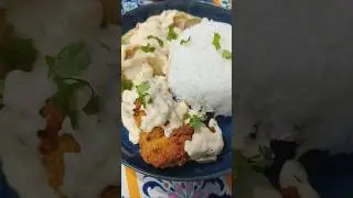 Herb Rice and Crispy fried chicken | Topped with cheesy white sauce #food #cooking #yummyfood