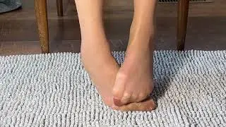 Sexy nylon feet under the table