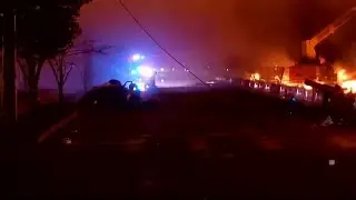 Protesters set Minneapolis police station on fire