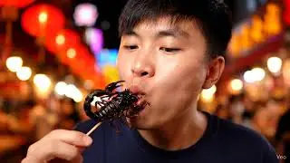 REAL Chinese Street Food: Watching a Man Eat a FRIED SCORPION