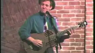 Catfish Keith in concert playing two song