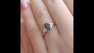 Engagement Ring: Australian Oval Teal Sapphire & diamond ring.