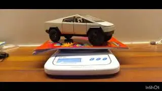 Weighing all my scale model cars...