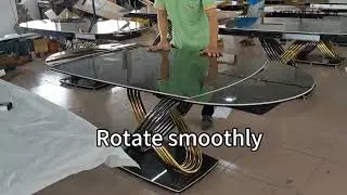 Oval extendable swivel dining table