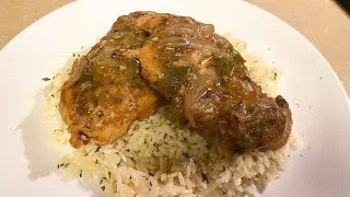 SMOTHERED CHICKEN BREAST WITH HOMEMADE RICE PILAF