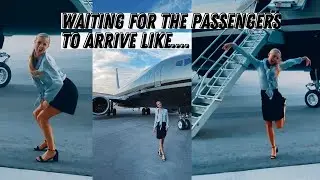 Flight attendant waiting for the passengers to arrive like...