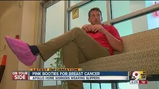 Technicians wear pink booties in support of Breast Cancer Month