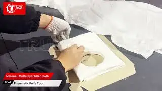 Multi-layer filter cloth cutting machine with pneumatic knife tool