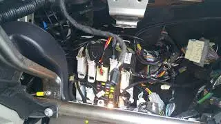 Icom mobile radio installed into a Ford Escape