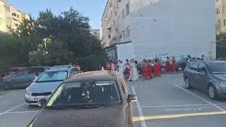 Gypsy walking party in Mangalia, Romania. Funny, aren't they?