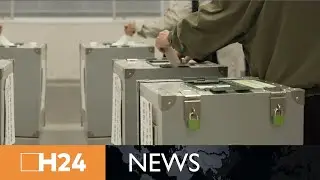 Japan PM Kishida's coalition to keep majority
