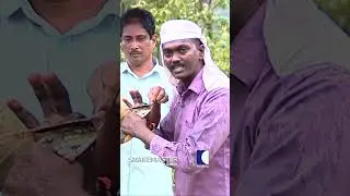 Vava Suresh takes measurements of a huge King Cobra, then releases it